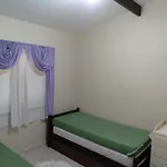 Casa Praia. Linda varanda para um cochilo na rede
