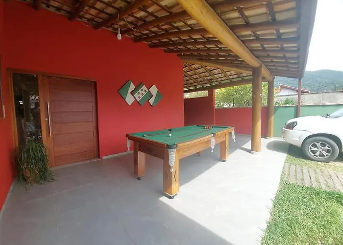 Casa Praia. Linda varanda para um cochilo na rede